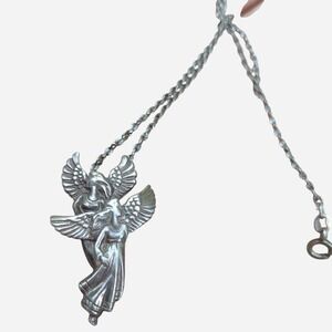 Shube's Dakota West sterling silver twin guardian angels pendant.